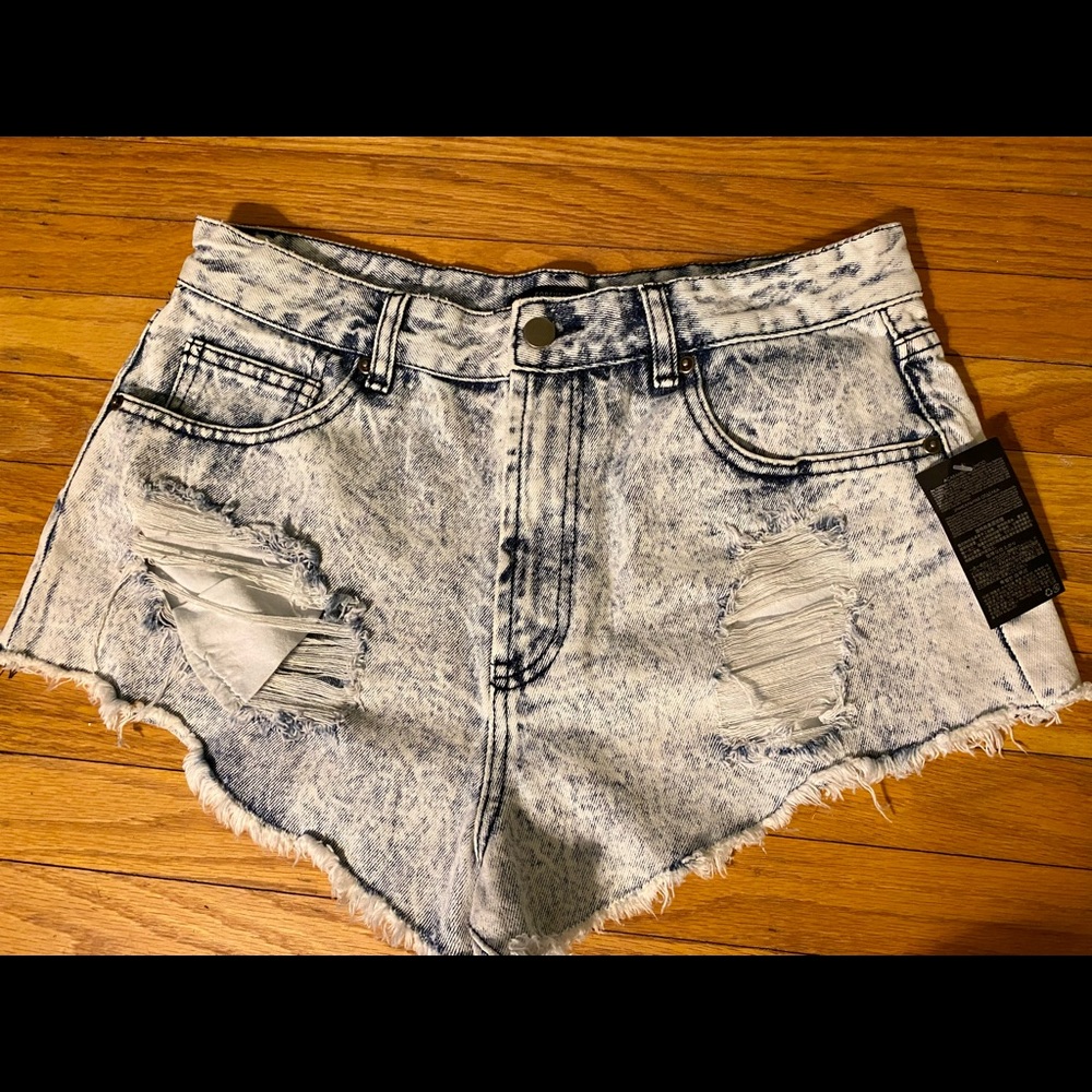 New with tags, high waisted light wash jean shorts. - Picture 1 of 10